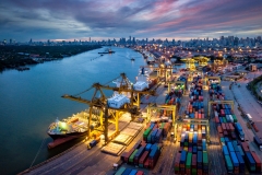 international port Crane loading containers Bangkok Thailand night